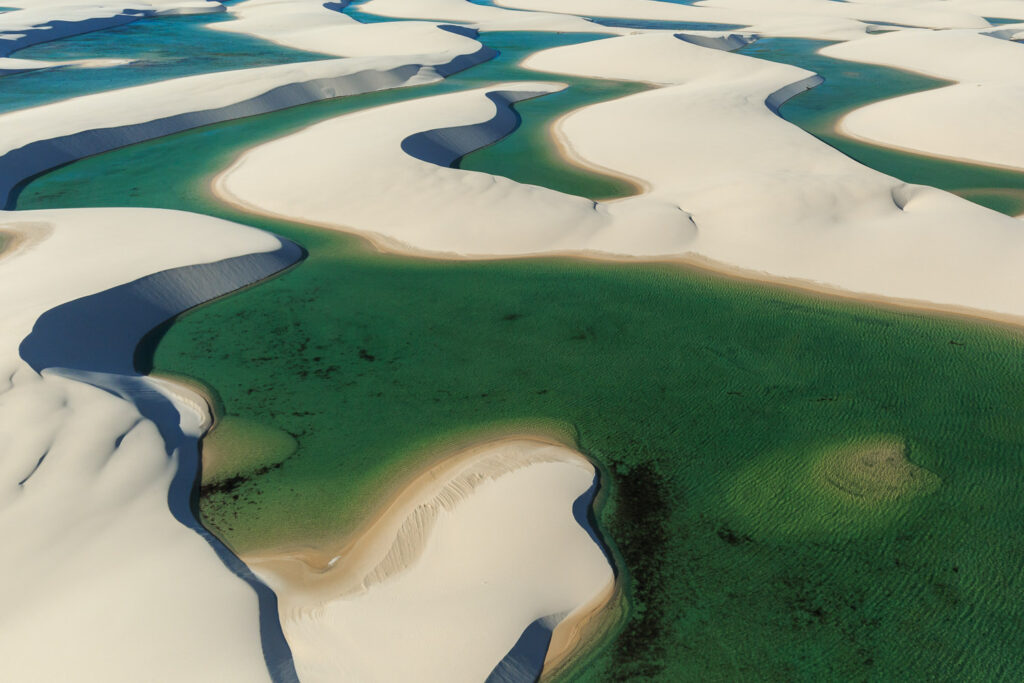 Aerial view of sand dunes and lagoons.