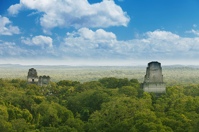 Guatemala-Tikal-pyramids-in-the-folliage-forest Guatemala-Tikal-pyramids-in-the-folliage-forest